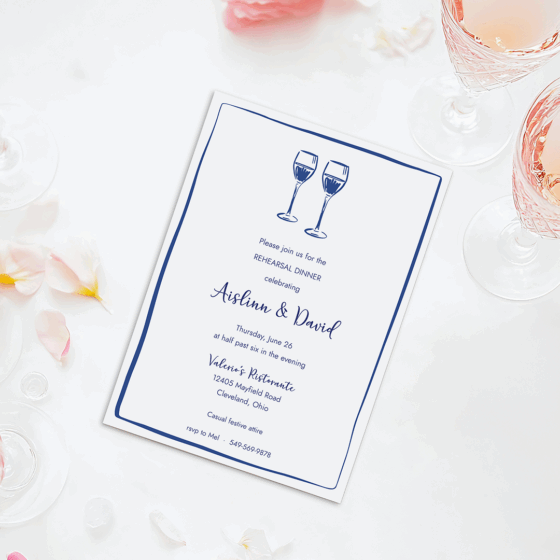 Rehearsal dinner party invitation with wine glasses