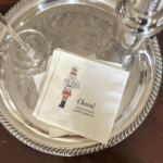 Elegant personalized holiday cocktail napkins with Cheers design and nutcracker artwork, 5×5 in 3-ply set of 100