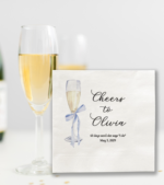 Personalized blue bridal shower napkins on white table
