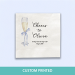 Personalized blue bridal shower napkins on white table