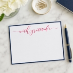 Luxury with gratitude raised ink note cards featuring pink calligraphy and navy border on premium triple-thick paper with white envelopes.