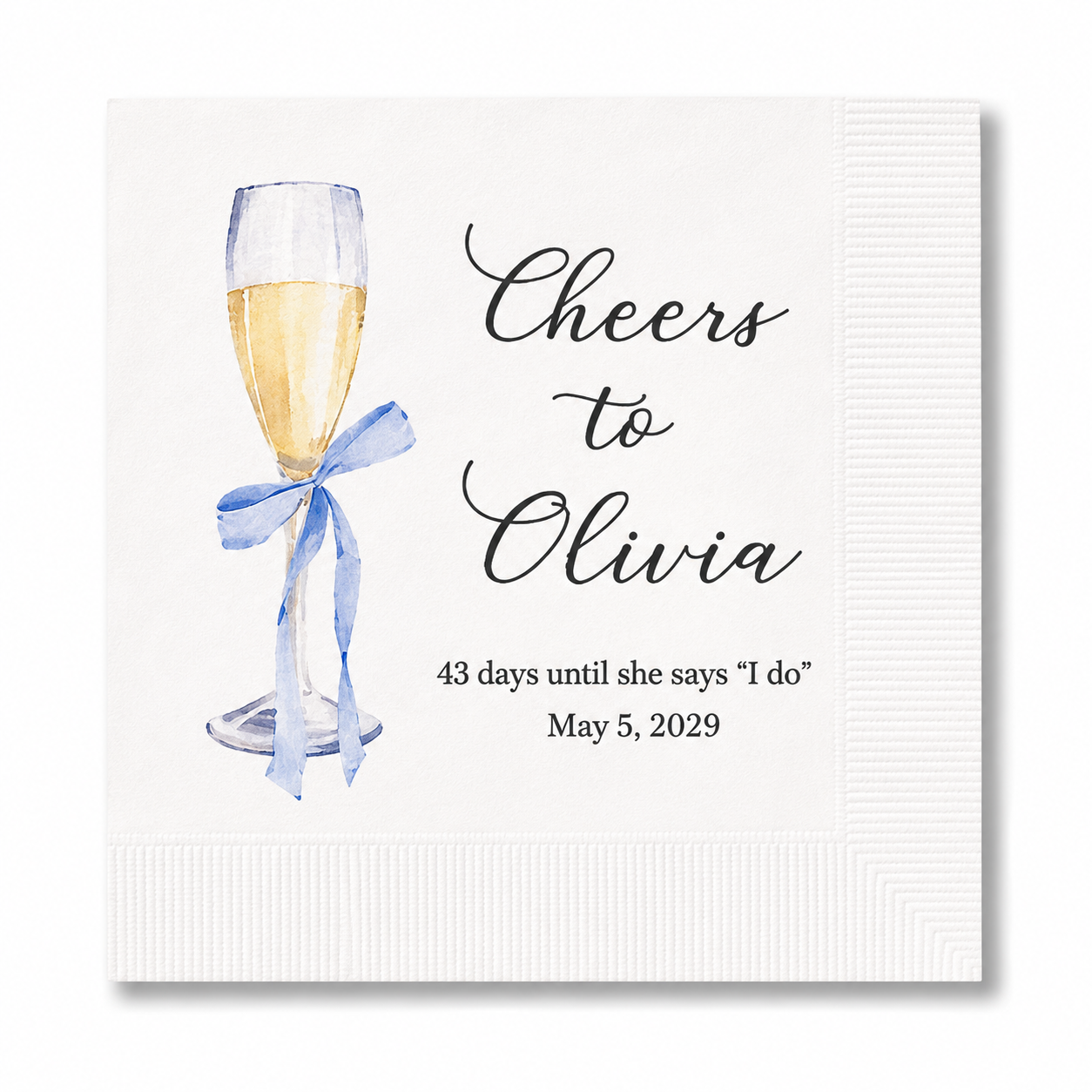 champagne-glass-blue-bow-main.webp Personalized Champagne Glass with Blue Bow Cocktail Napkins