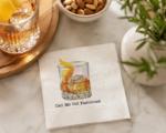 Personalized Old Fashioned cocktail napkins displayed beside a whiskey cocktail